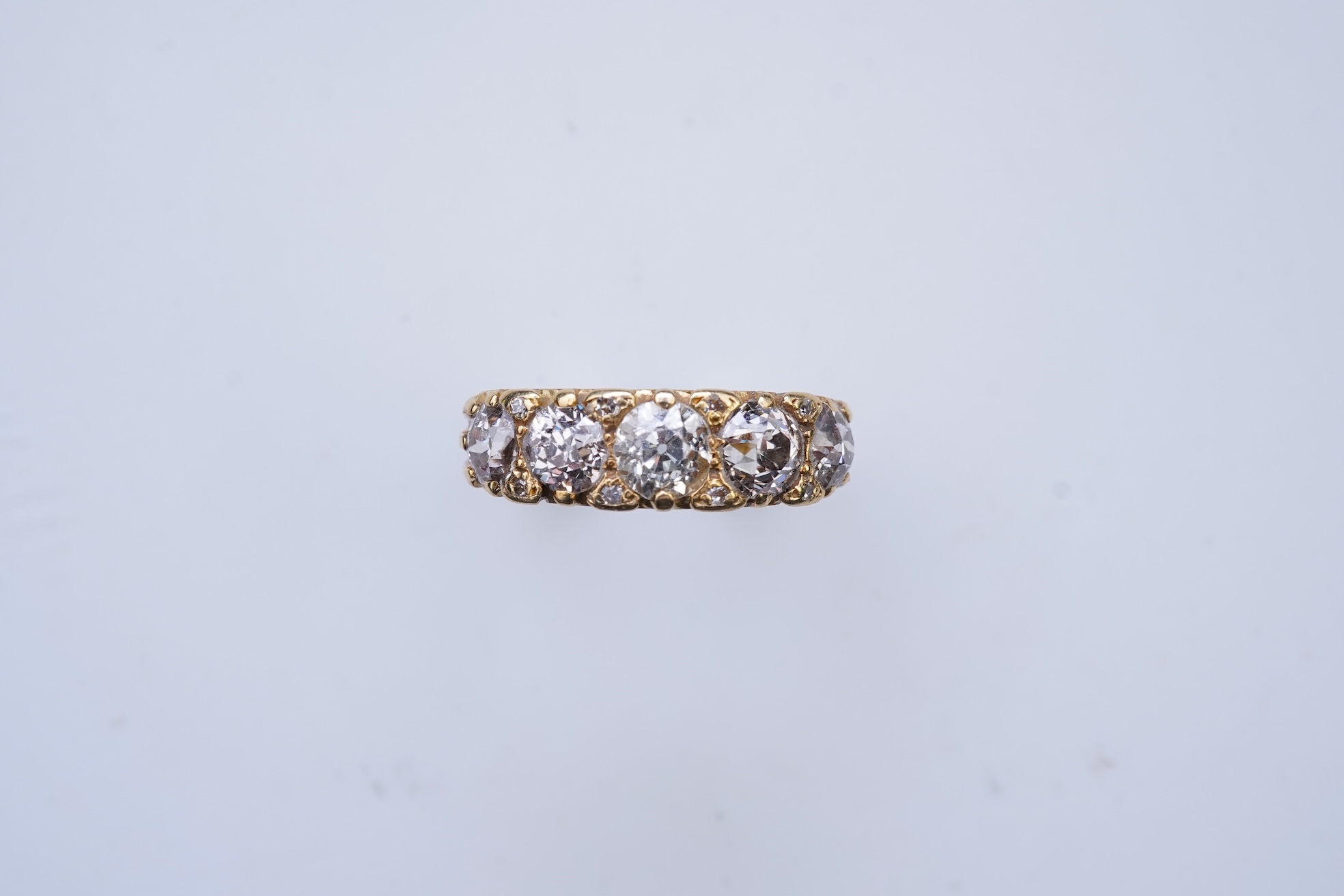 A five-stone diamond ring, circa 1900